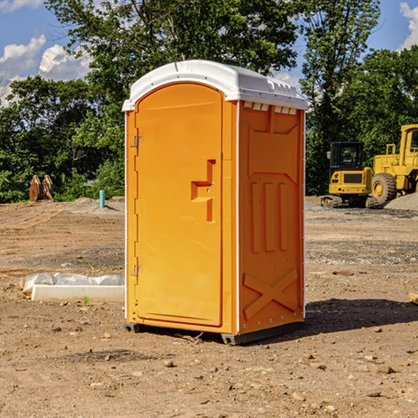 what is the cost difference between standard and deluxe portable restroom rentals in Burt